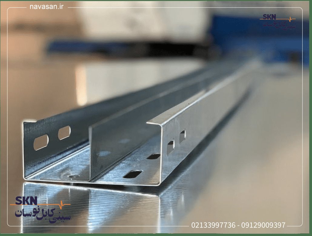 a-cable-tray-with-a-divider-is-installed-and-punched-behind-which-there-is-a-blue-and-white-cnc-punching-machine-1030x778 سینی کابل عرض 10 سانت با دیوایدر سینی کابل نصب شده برای جداسازی کابل برق و شبکه در پروژه های نصب دوربین مدار بسته